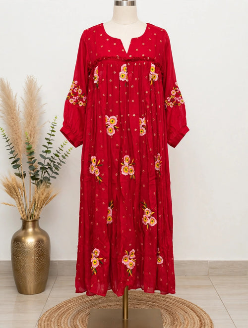Red floral embroidered maxi dress with scattered pink and yellow flowers and gold dot print