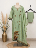 Sage green printed kurta set with jewel-embellished neckline, forest print dupatta and matching pants